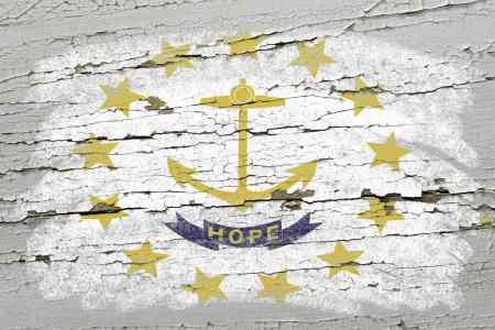 Rhode Island state emblem on peeling paint